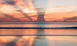 Mer et rayons de soleil - Photo par Ravi Pinisetti (unsplash.com)