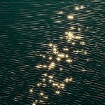 Lights on water from Tim Zankert (unsplash.com)